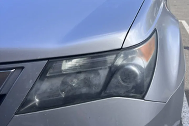 Acura MDX headlight before ANHEM restoration