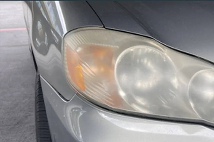 Toyota Corolla headlight before ANHEM restoration